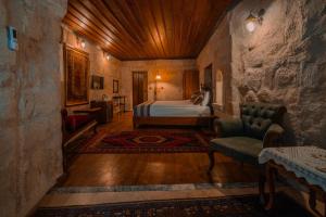Postel nebo postele na pokoji v ubytování Aydinli Cave Hotel