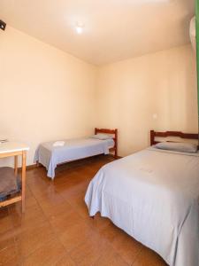 Postel nebo postele na pokoji v ubytování Plaza Hotel Jataí By Easy Hotéis