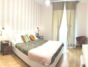 Posteľ alebo postele v izbe v ubytovaní Monti49 GuestHouse