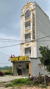 a hotel building with a hotel sign on it at Royal Hotel Vĩnh Phúc in Vĩnh Phúc