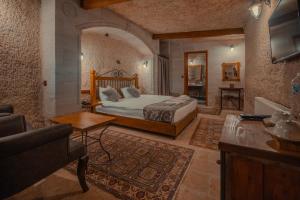 Voodi või voodid majutusasutuse Aydinli Cave Hotel toas