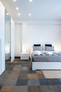 Giường trong phòng chung tại Villa Paradiso plemmirio +20 ảnh