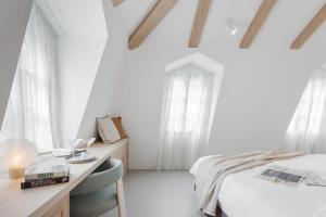 Fotografie z fotogalerie ubytování Hôtel de La Cigogne v destinaci Saint-Ursanne + 19 fotografií