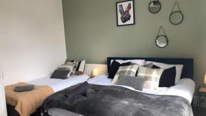 מיטה או מיטות בחדר ב-Ambiance cosy 1-bedroom apt