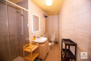 a bathroom with a sink and a shower and a toilet at Herminia in La Herradura +36 photos