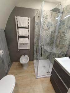 a bathroom with a shower and a toilet at CASA VACANZE AURORA in Ortona