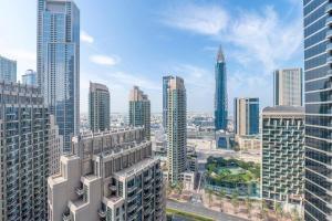 an aerial view of a city with tall buildings at Address Dubai Opera Residences by Qstay in Dubai