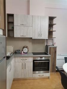 Kuchyň nebo kuchyňský kout v ubytování Cosy home Lalëz Durrës