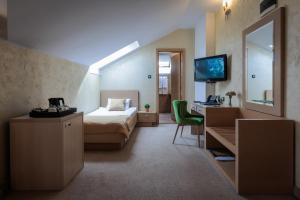 Voodi või voodid majutusasutuse Euro Garni Hotel toas +37 fotot