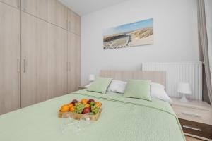 Posteľ alebo postele v izbe v ubytovaní Apartamenty Horyzont SeaView by Rent like home