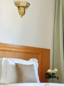 Majliss Hotel Downtown客房内的一张或多张床位