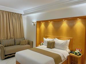 Majliss Hotel Downtown客房内的一张或多张床位