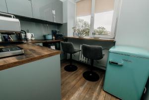 Η κουζίνα ή μικρή κουζίνα στο Cozy apartment in city center +20 φωτογραφίες