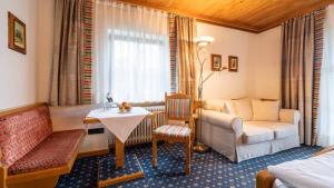 Posezení v ubytování Hotel Alpina