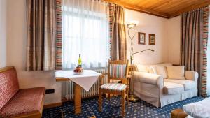 Posezení v ubytování Hotel Alpina
