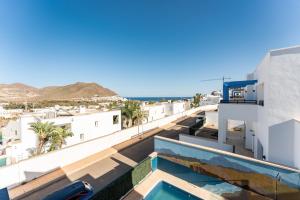 a view from the roof of a building with a swimming pool at CT 297 AL - Faro's Villa Las Arenas - San José in Níjar