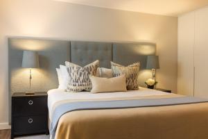 Ein Bett oder Betten in einem Zimmer der Unterkunft Boutique Hotel Stari Grad