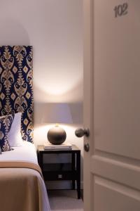 Ein Bett oder Betten in einem Zimmer der Unterkunft Boutique Hotel Stari Grad