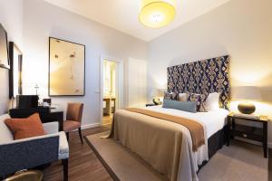 Ein Bett oder Betten in einem Zimmer der Unterkunft Boutique Hotel Stari Grad