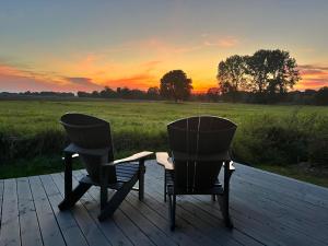 Tinyhouse mit Wiesenblick, Holzdeck und Kamin