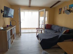 A television and/or entertainment centre at Arte Casa