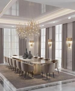 Luxary Home VIP Flora inn في باكو: غرفة طعام مع طاولة وكراسي كبيرة