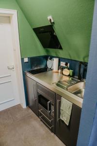 Köök või kööginurk majutusasutuses sleepArt green
