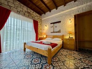 Postel nebo postele na pokoji v ubytování Cesme Elysium Hotel