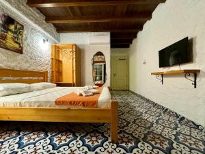 TV a/nebo společenská místnost v ubytování Cesme Elysium Hotel
