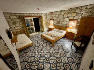 Postel nebo postele na pokoji v ubytování Cesme Elysium Hotel