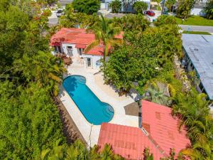 an aerial view of a house with a swimming pool at Crescent Beach Villas in Siesta Key