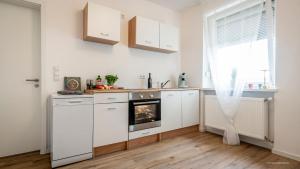 Kuchyň nebo kuchyňský kout v ubytování WineDesign Boxspring 8 Pers BASF Nähe Ludwigshafen und Mannheim