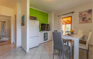 Kuchyň nebo kuchyňský kout v ubytování Apartment Biskupija Iii