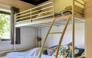 a bunk bed room with two bunk beds in it at Beautiful Home In Vejby With Wifi in Vejby