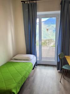 Ένα ή περισσότερα κρεβάτια σε δωμάτιο στο Hotel Panorama
