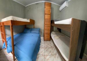 Postel nebo postele na pokoji v ubytování Hostel Sol da Barra
