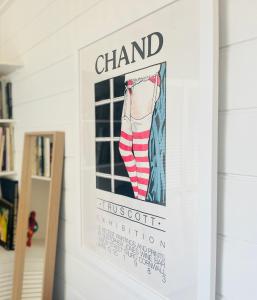 um cartaz de uma meia pendurada numa parede em Charming Two Bed house in Central Penzance em Penzance