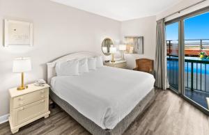 Ein Bett oder Betten in einem Zimmer der Unterkunft SunDestin Resort Unit 0112