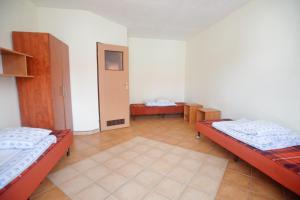 Postel nebo postele na pokoji v ubytování Pokoje przy Spokojnej