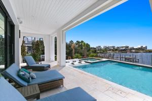 a swimming pool in a house with a patio at 283 Lakeview Drive in Seagrove Beach