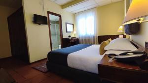 TV a/nebo společenská místnost v ubytování Corsaro Etna Hotel&SPA