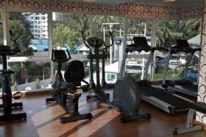 a gym with cardio equipment and a large window at Perfect Studio your holiday in Krabi Condo & Apartment in Ban Khlong Haeng
