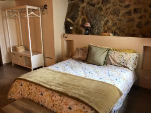 A bed or beds in a room at Casa Puri