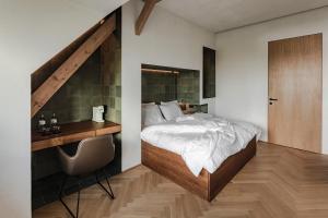 Postel nebo postele na pokoji v ubytování Lukas Kapeller Hotel und Restaurant