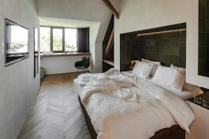 Postel nebo postele na pokoji v ubytování Lukas Kapeller Hotel und Restaurant