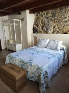 A bed or beds in a room at Casa Puri