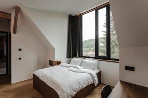 Postel nebo postele na pokoji v ubytování Lukas Kapeller Hotel und Restaurant