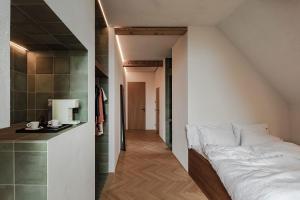 Postel nebo postele na pokoji v ubytování Lukas Kapeller Hotel und Restaurant
