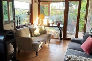 Posezení v ubytování Chalet Mimosa