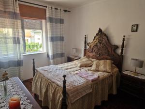 Кровать или кровати в номере Vivenda Atlantico